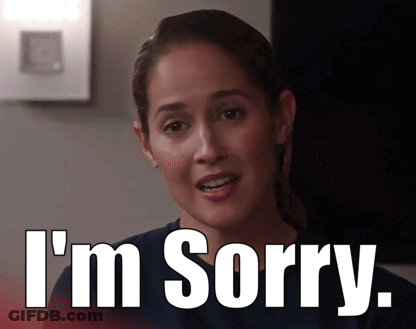 A Woman Says I 'M Sorry In Front Of A Picture Of Her GIF