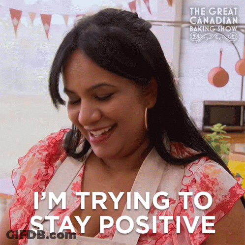 A Woman Says I 'M Trying To Stay Positive On A Screen GIF