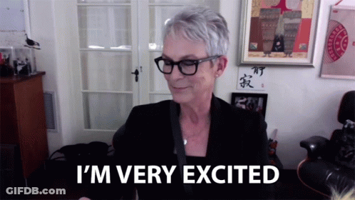 A Woman Says I 'M Very Excited In Front Of A Window GIF