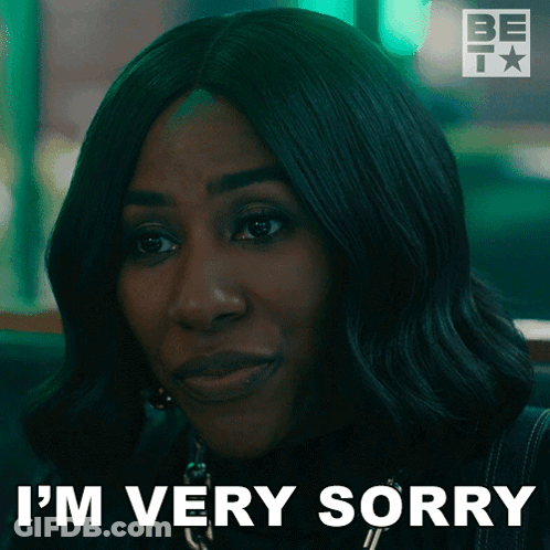 A Woman Says " I 'M Very Sorry " In Front Of A Green Background GIF
