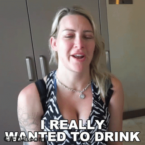 A Woman Says I Really Wanted To Drink In Front Of A Closet GIF
