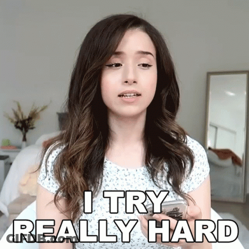 A Woman Says I Try Really Hard While Looking At Her Phone GIF