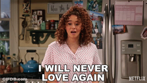 A Woman Says I Will Never Love Again In Front Of A Fridge GIF