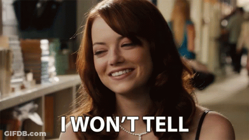 A Woman Says I Won 'T Tell In A Hallway GIF