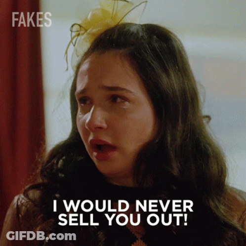 A Woman Says I Would Never Sell You Out While Wearing A Flower In Her Hair GIF