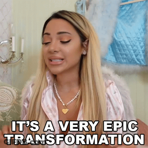 A Woman Says It 'S A Very Epic Transformation While Wearing Angel Wings GIF