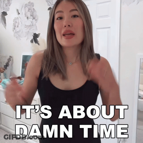 A Woman Says It 'S About Damn Time In Front Of A Dresser GIF