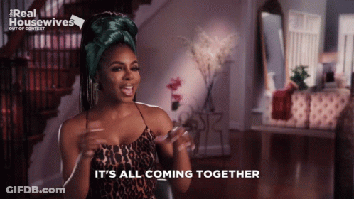 A Woman Says It 'S All Coming Together While Wearing A Leopard Print Top GIF