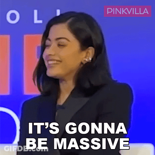 A Woman Says It 'S Gonna Be Massive In Front Of A Blue Background GIF