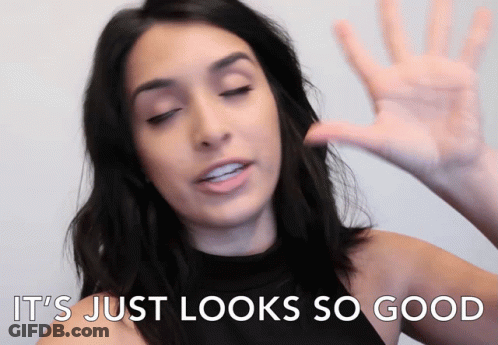 A Woman Says " It 'S Just Looks So Good " With Her Hand GIF