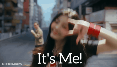 A Woman Says It 'S Me While Making A Hand Gesture GIF