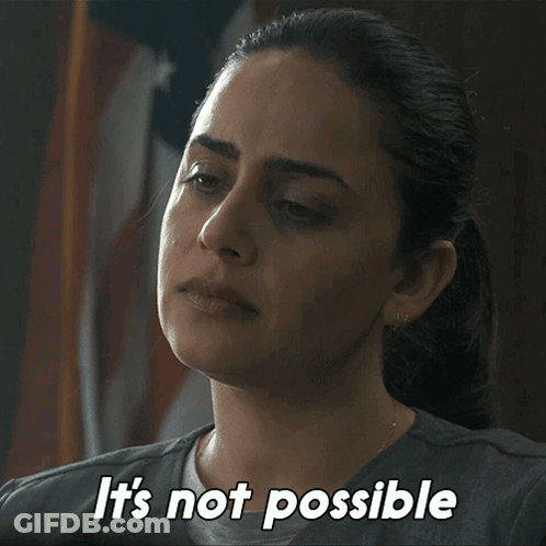 A Woman Says " It 'S Not Possible " While Looking At Something GIF