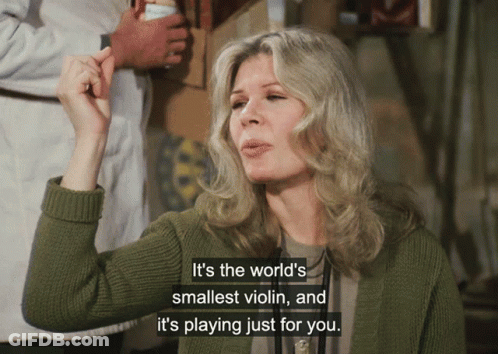 A Woman Says It 'S The World 'S Smallest Violin And It 'S Playing Just For You .. GIF