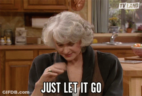 A Woman Says Just Let It Go In A Kitchen Scene GIF