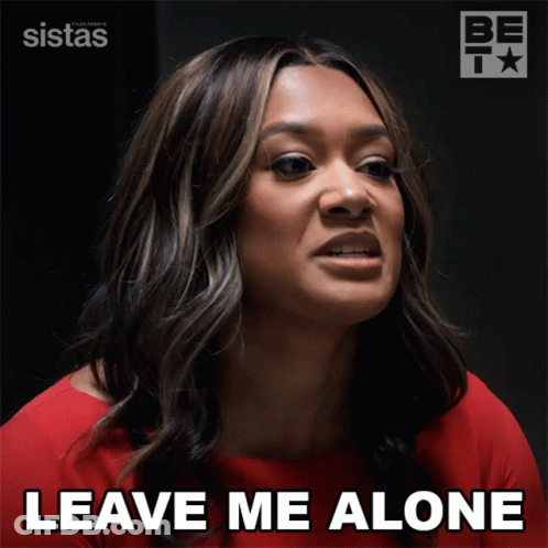 A Woman Says " Leave Me Alone " While Wearing A Red Top GIF