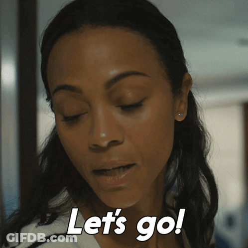 A Woman Says Let 'S Go In White Letters On Her Face GIF