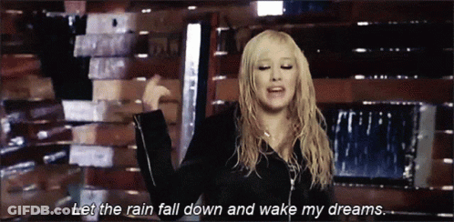 A Woman Says Let The Rain Fall Down And Wake My Dreams In A Video GIF