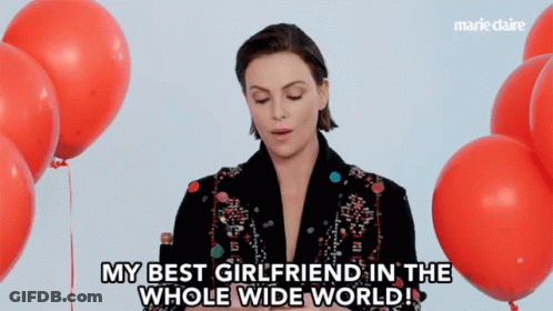A Woman Says " My Best Girlfriend In The Whole Wide World " In Front Of Balloons GIF