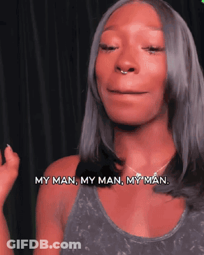 A Woman Says My Man My Man My Man In Front Of A Black Background GIF