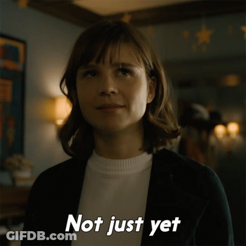 A Woman Says " Not Just Yet " In Front Of Her GIF