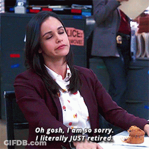 A Woman Says Oh Gosh I Am So Sorry I Literally Just Retired While Sitting At A Table GIF