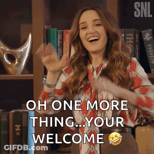 A Woman Says Oh One More Thing Your Welcome In Front Of A Bookcase GIF