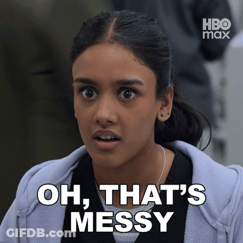 A Woman Says Oh That 'S Messy While Wearing A Hoodie GIF