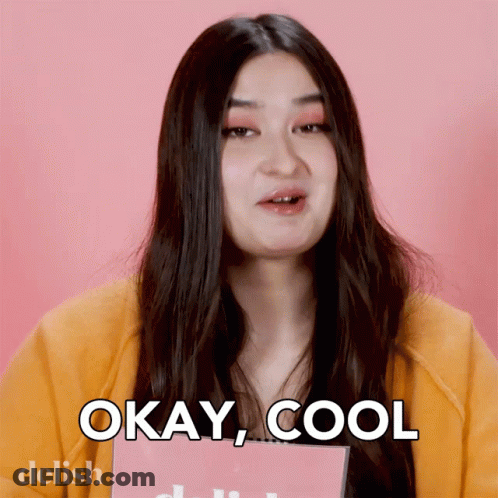A Woman Says " Okay Cool " While Holding A Book GIF