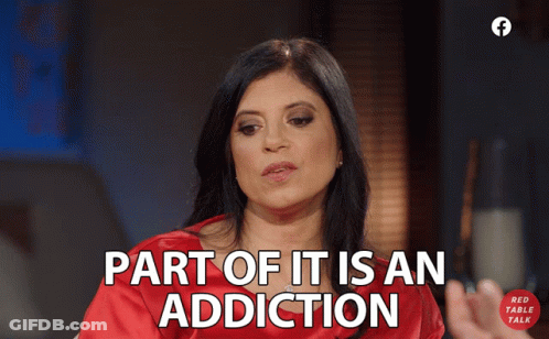 A Woman Says Part Of It Is An Addiction In A Red Shirt GIF
