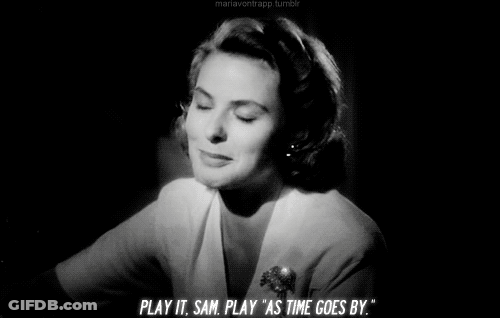 A Woman Says Play It Sam Play As Time Goes By In A Black And White Photo GIF