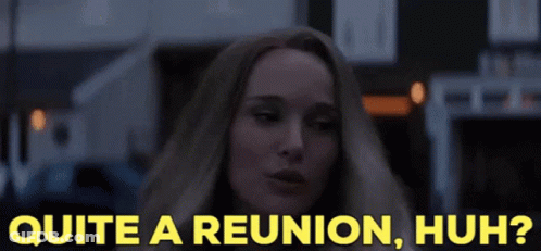 A Woman Says Quite A Reunion Huh In A Dark Room GIF