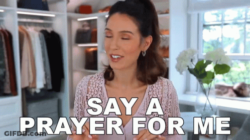 A Woman Says " Say A Prayer For Me " In A Closet GIF