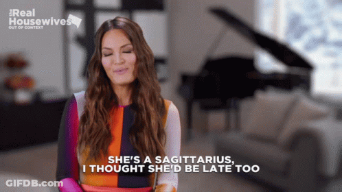 A Woman Says She 'S A Sagittarius In Front Of A Piano GIF