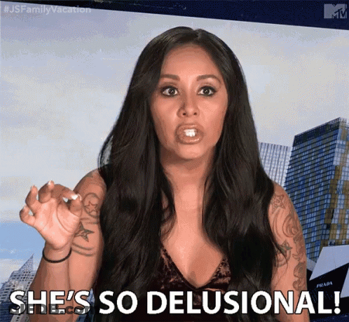 A Woman Says She 'S So Delusional In Front Of A Building GIF