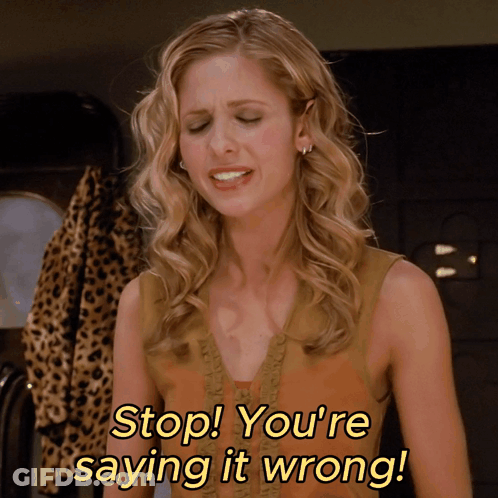 A Woman Says " Stop You 'Re Saying It Wrong " In Yellow Letters GIF