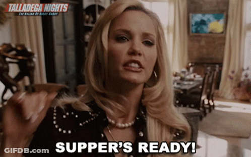 A Woman Says " Supper 'S Ready " In Front Of A Sign For Talladega Nights GIF