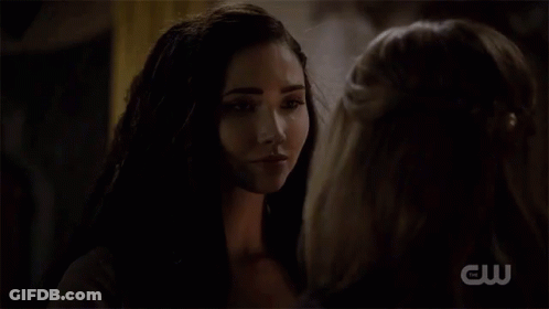 A Woman Says " Thank You Talon " To Another Woman In A Dark Room GIF