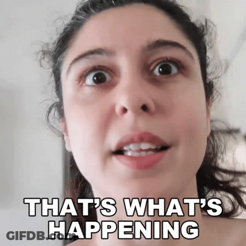 A Woman Says That 'S What 'S Happening In Front Of A White Background GIF