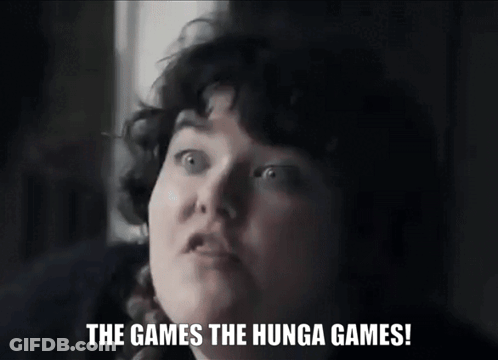 A Woman Says " The Games The Hunga Games " In A Black And White Photo GIF