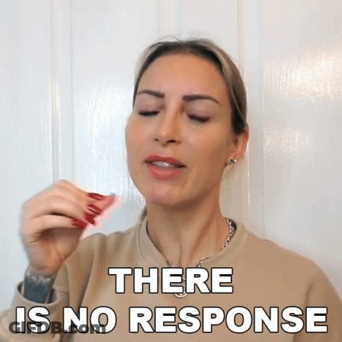 A Woman Says There Is No Response While Holding A Napkin GIF