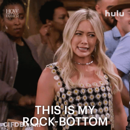 A Woman Says " This Is My Rock Bottom " In Front Of A Crowd GIF