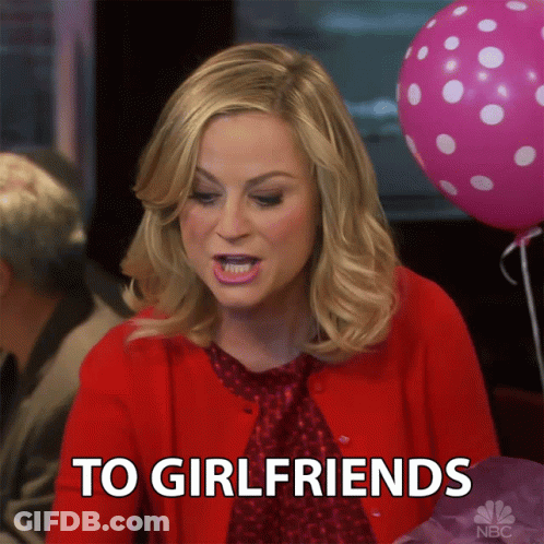 A Woman Says To Girlfriends In Front Of Balloons GIF