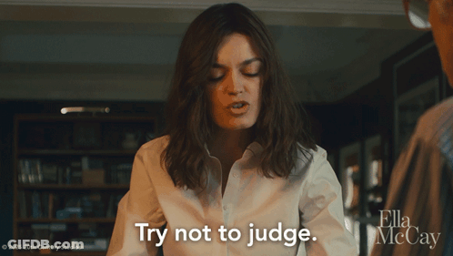 A Woman Says " Try Not To Judge " In A Ella Mccay Movie GIF