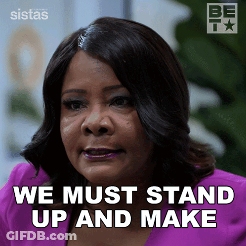 A Woman Says " We Must Stand Up And Make " In A Purple Shirt GIF