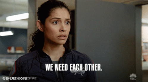 A Woman Says We Need Each Other While Wearing A Jacket That Says Chicago Fire Department GIF