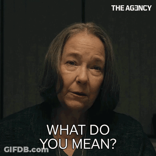 A Woman Says " What Do You Mean " In Front Of A Sign That Says The Agency GIF