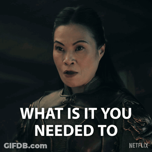 A Woman Says What Is It You Needed To In A Dark Room GIF