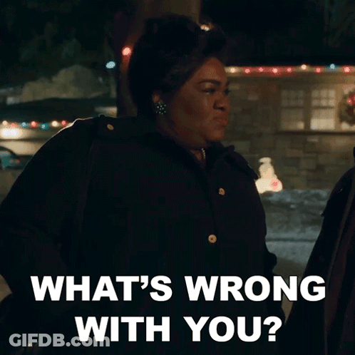 A Woman Says What 'S Wrong With You While Standing In Front Of A House GIF