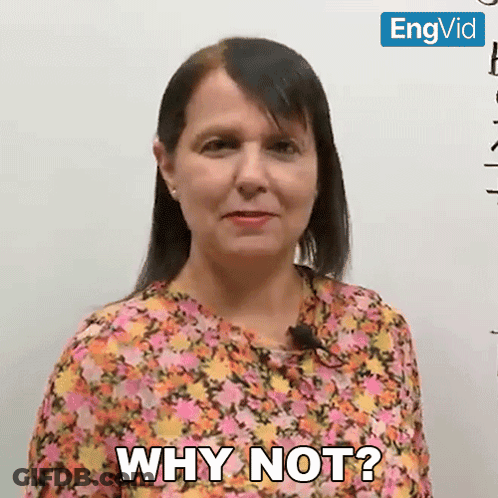 A Woman Says Why Not In Front Of A Whiteboard GIF