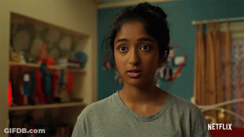 A Woman Says Woah In Front Of A Netflix Ad GIF